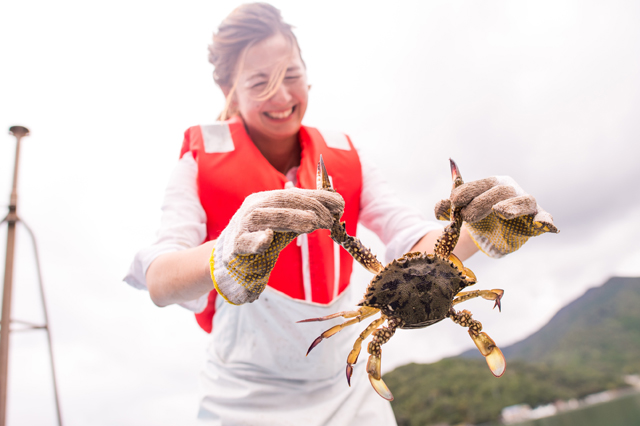 Irene with a female blue crab