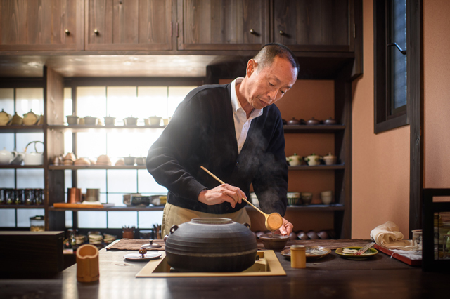 Mr. Matsumoto prepares tea at the counter