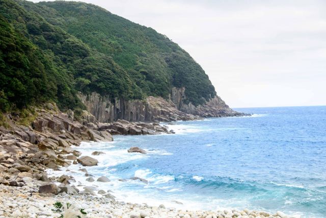 rock shore and cliff beaten by the waves