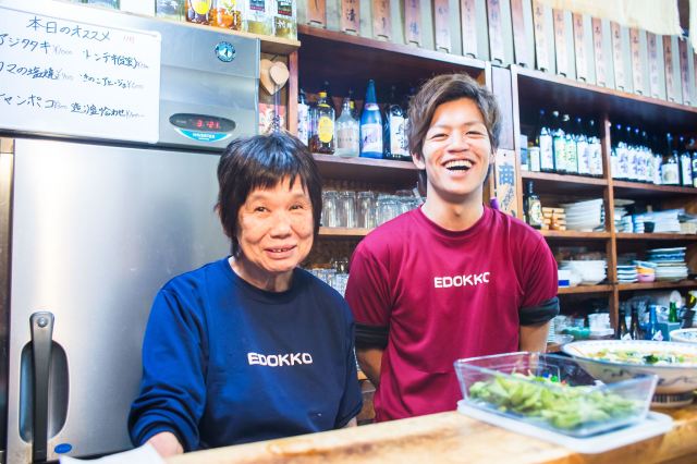 Grandmother and grandson, working together to keep the taste of the predecessor