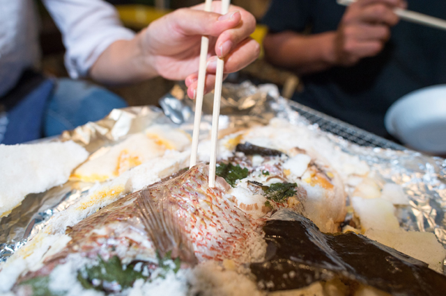 chopsticks and salt grilled bream