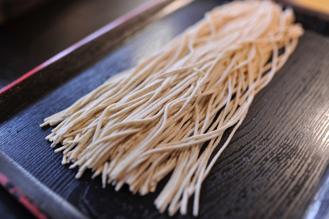 Starting with whole grains, the husks are removed.  Using a stone mill, just enough flour is ground for the day’s allotment of soba.