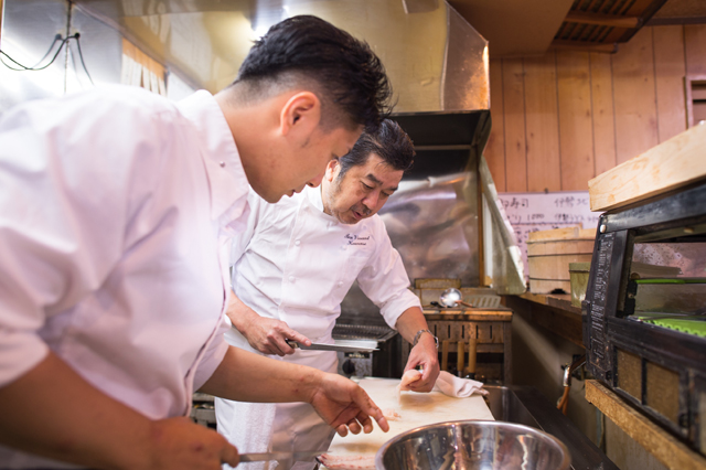 Chefs Kawase and Imamura cooking